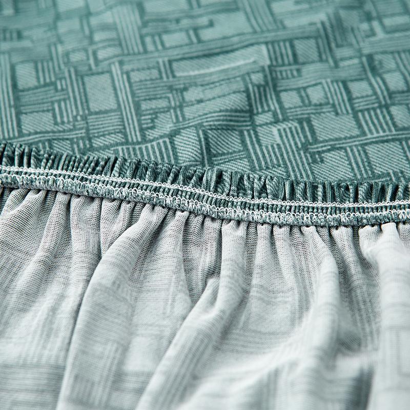 Stretch-Sofabezug mit geometrischem Linienmuster – Pastellgrün – Ansicht 2