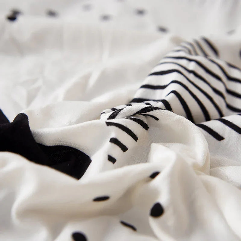 Stretch-Sofabezug mit Druckmuster – Whitecrusha – Ansicht 4