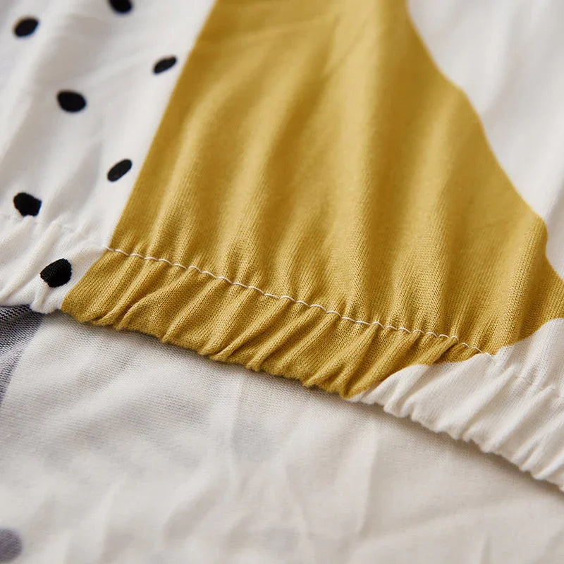 Stretch-Sofabezug mit Druckmuster – Whitecrusha – Ansicht 5
